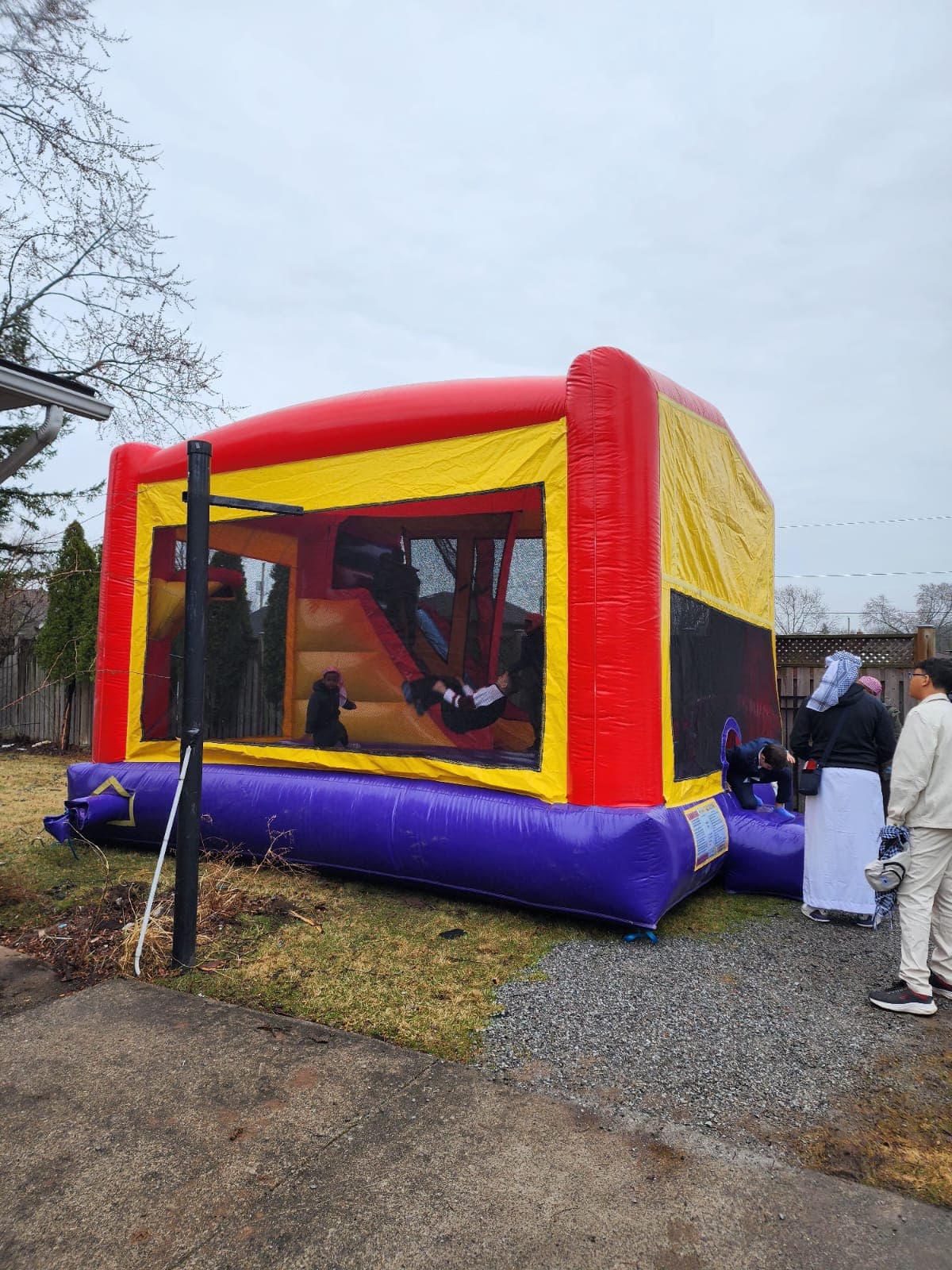 Family Eid celebration with a bouncy castle